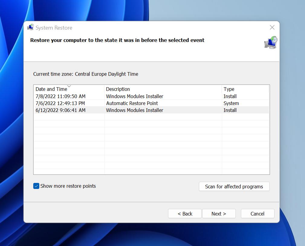 In the new window, click on System Restore
Select a restore point from a date before the bubble-trouble.exe errors began